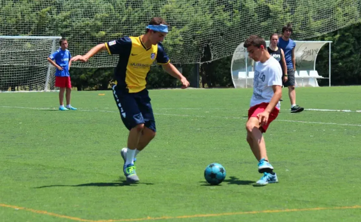 Students play soccer