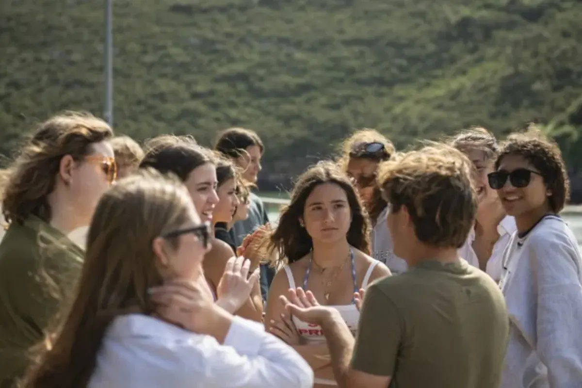 Students speak in a group