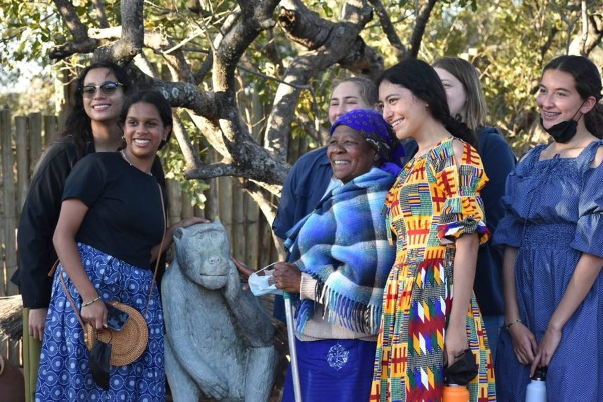 Students visiting a village in Botswana