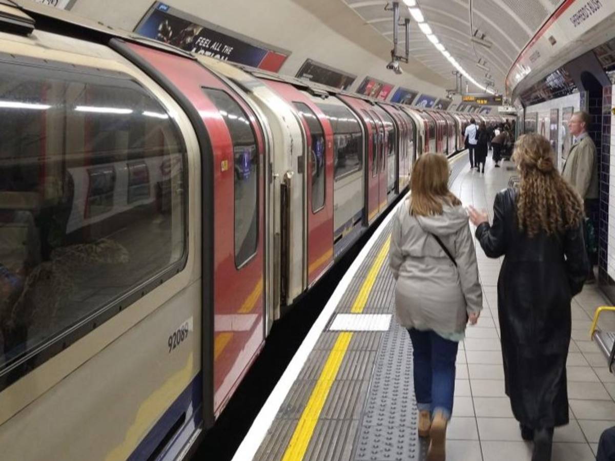 Students walk along the platform at Shepherd’s Bush Underground station in London.