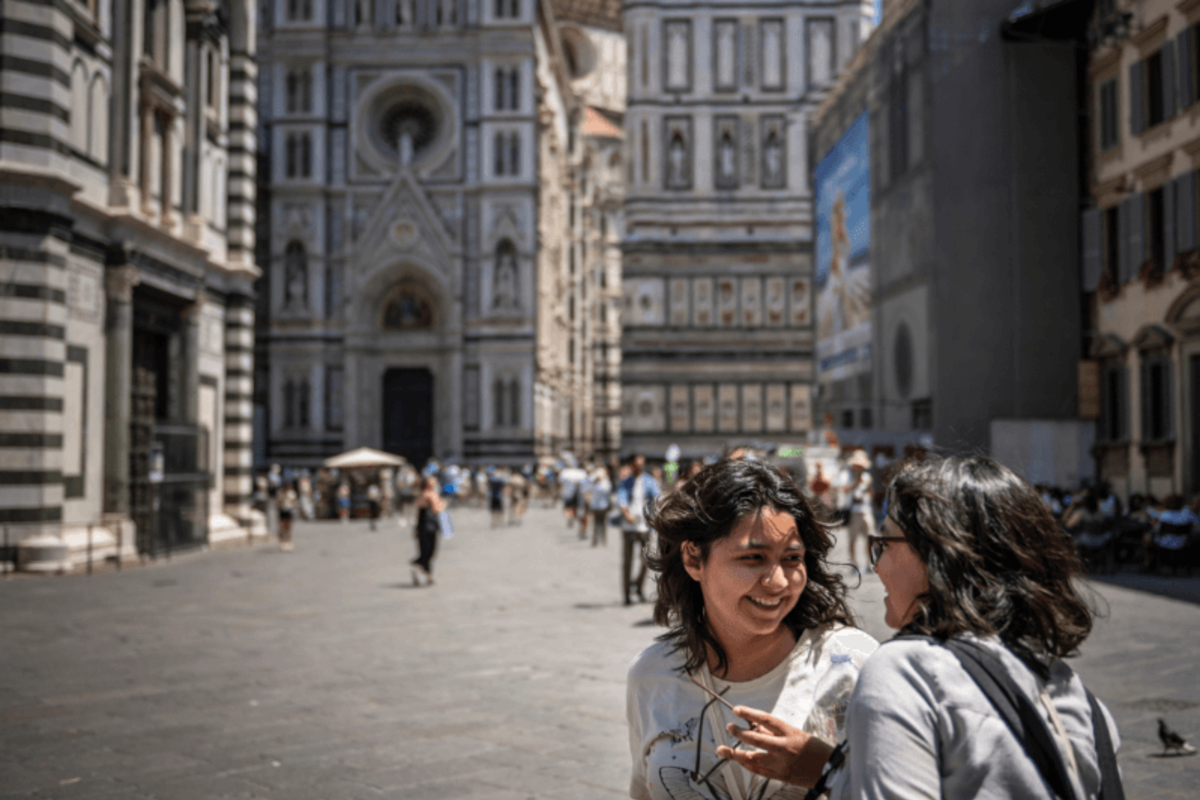 Students walk in Florence