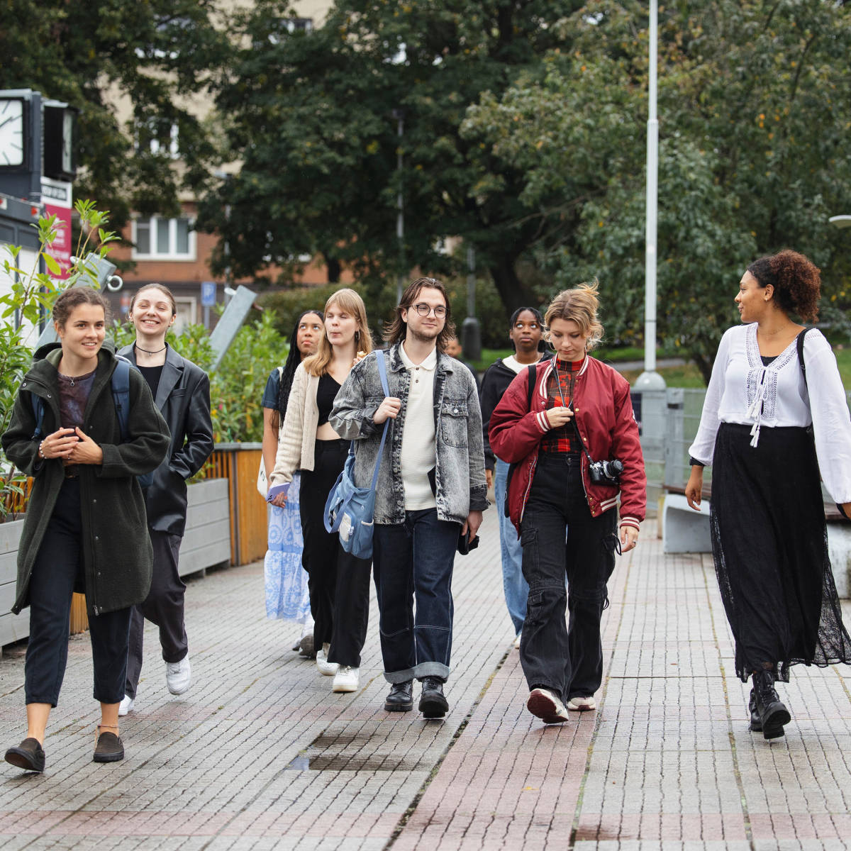 Students walk outside in Prague.