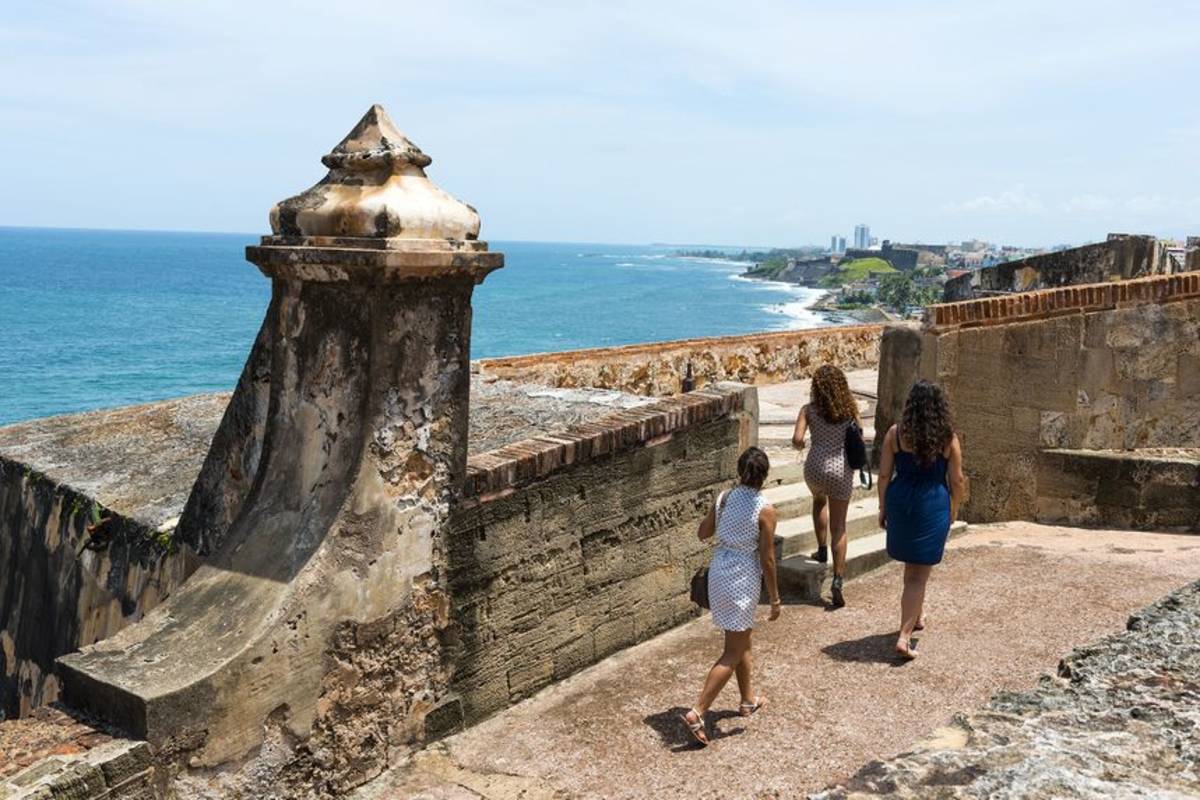 Students walking on wall in San Juan