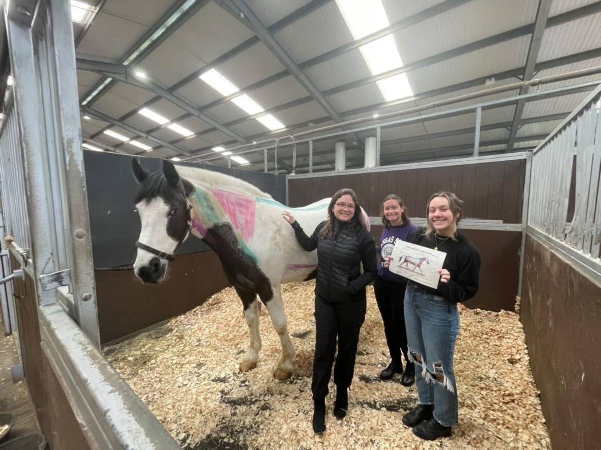 Students with a horse