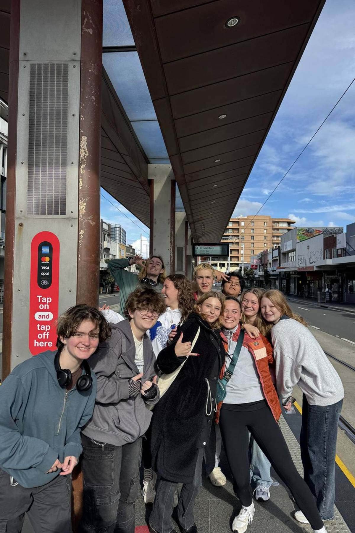 Sydney students waiting for train