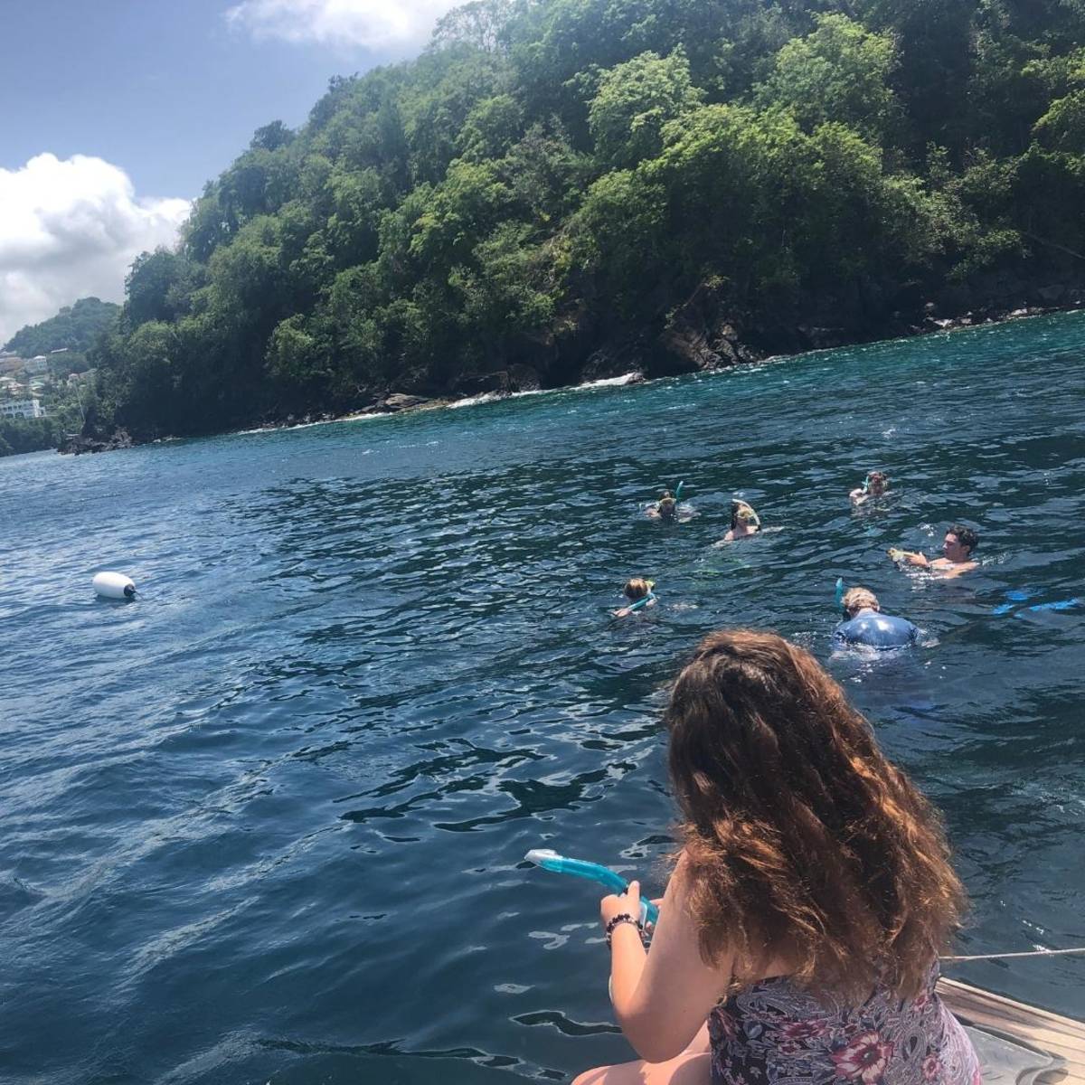 Teens snorkeling in Caribbean