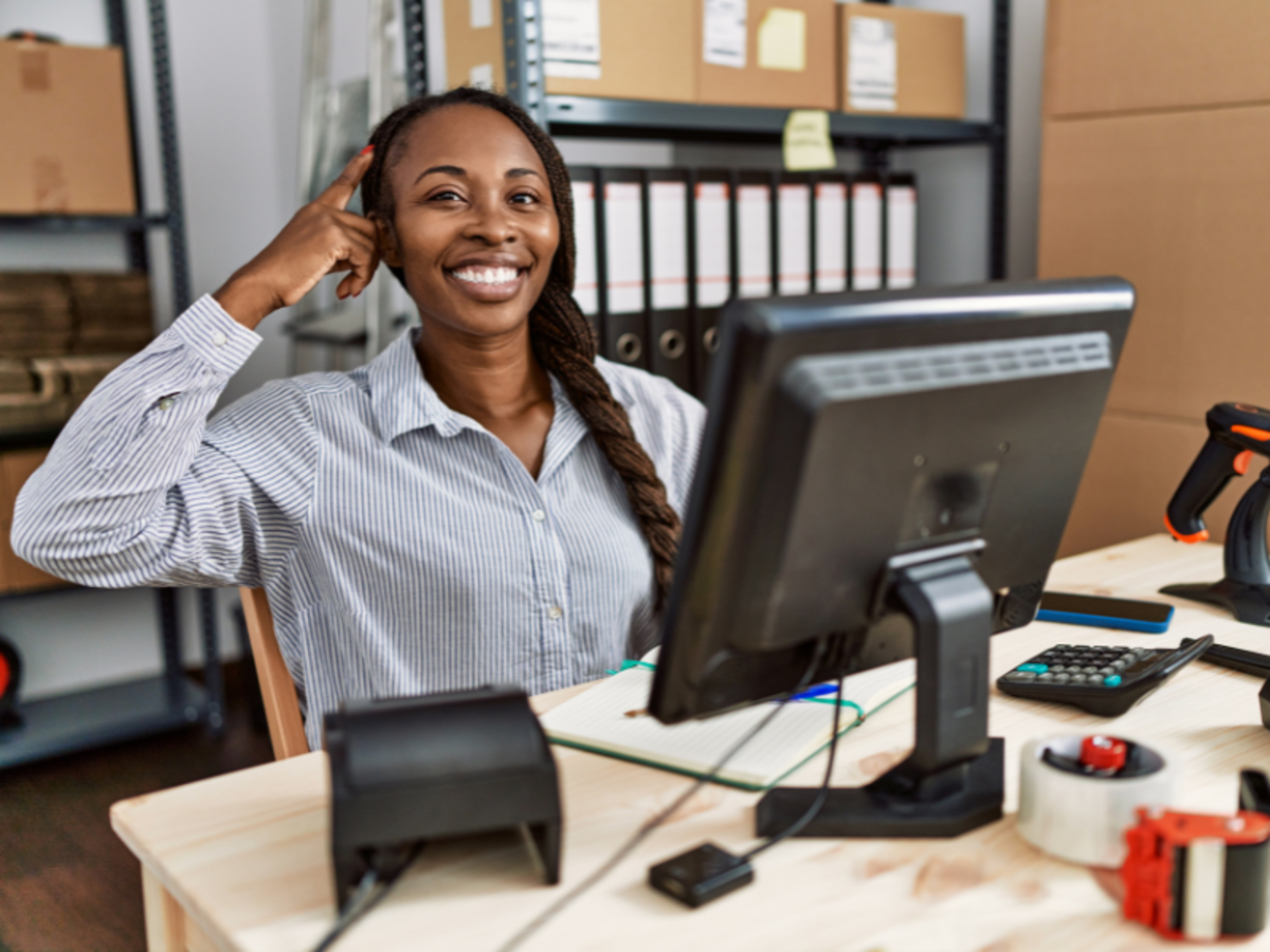 This image shows a person working in an office environment.