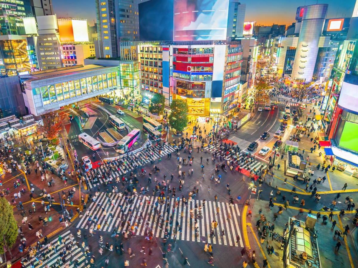 Top view of Shibuya Crossing at twilight in Tokyo