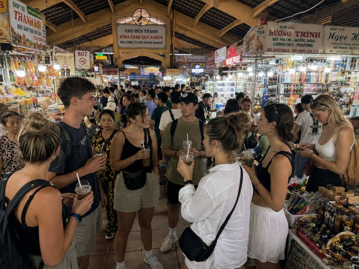 Travellers exploring Ben Thanh Market in Ho Chi Minh City