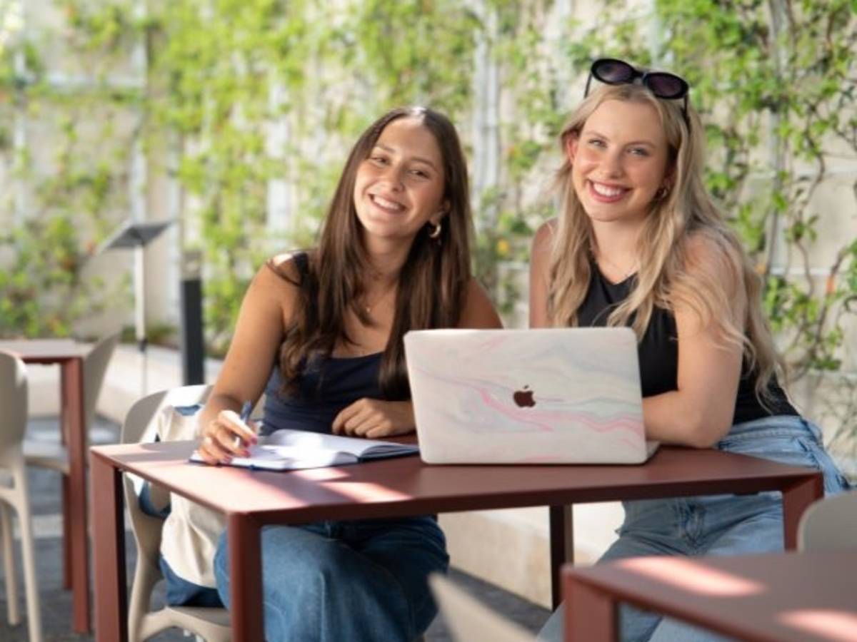 Two study abroad students smiling
