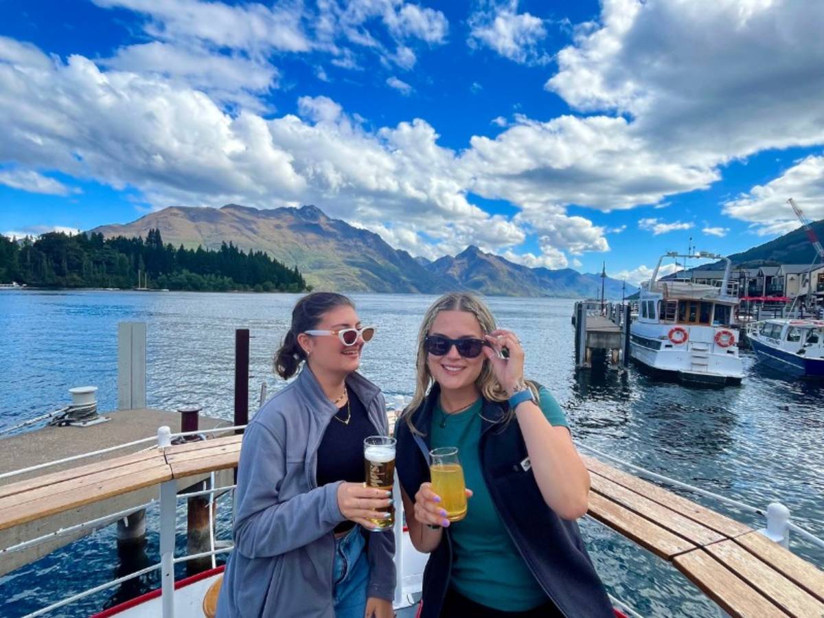 Two women on a boat in Queenstown, New Zealand