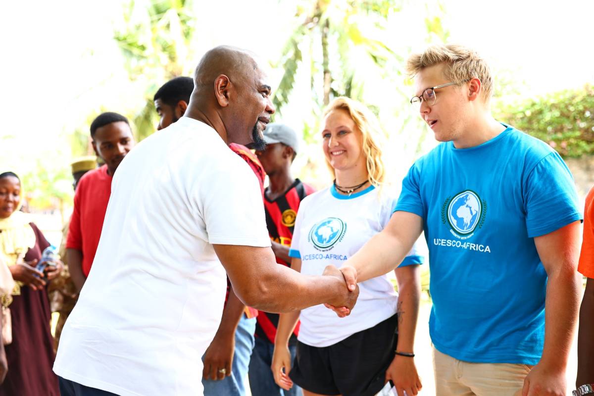 UCESCO volunteers with locals