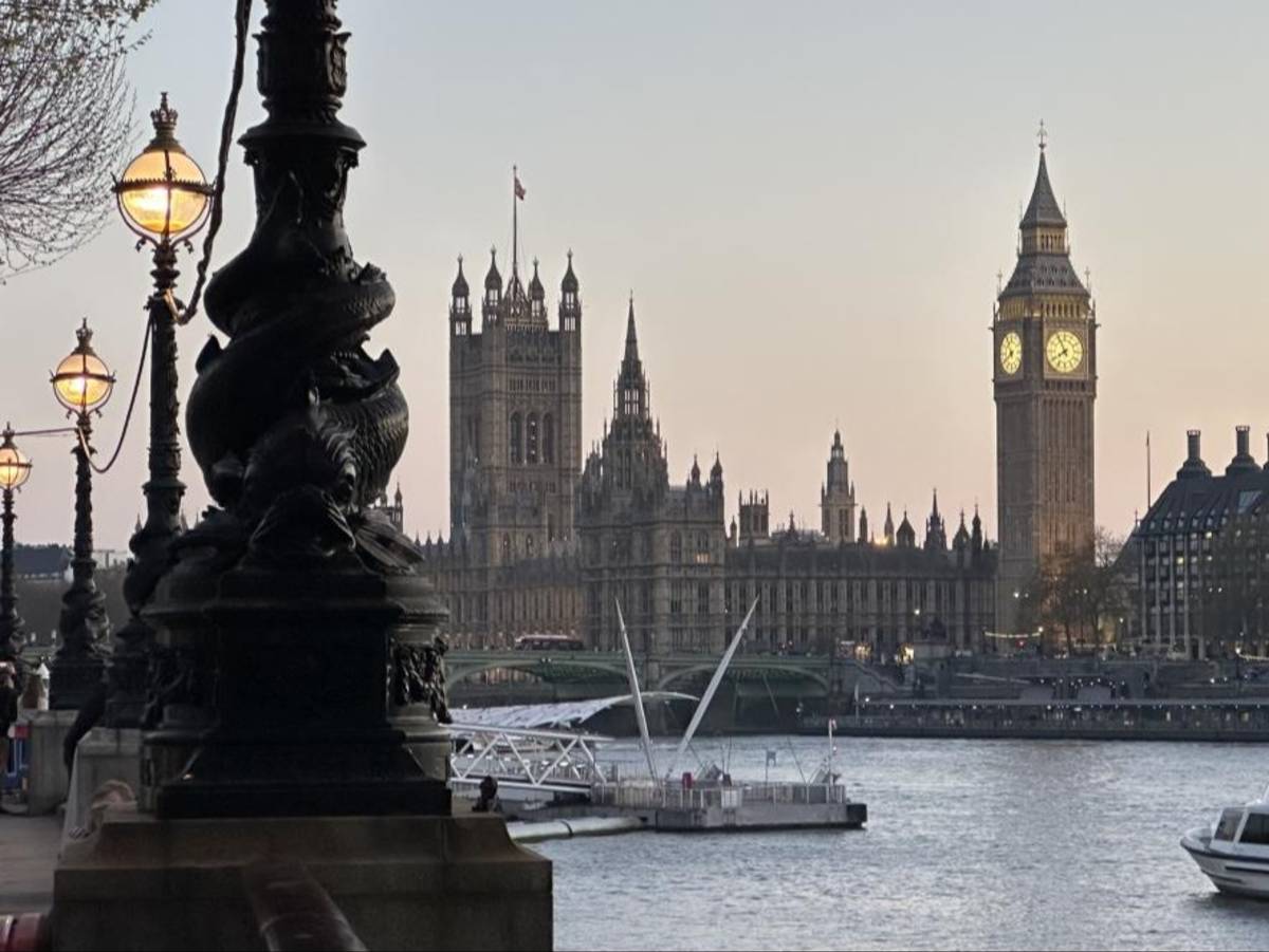 View of Big Ben and the Houses of Parliament along the River Thames in London.