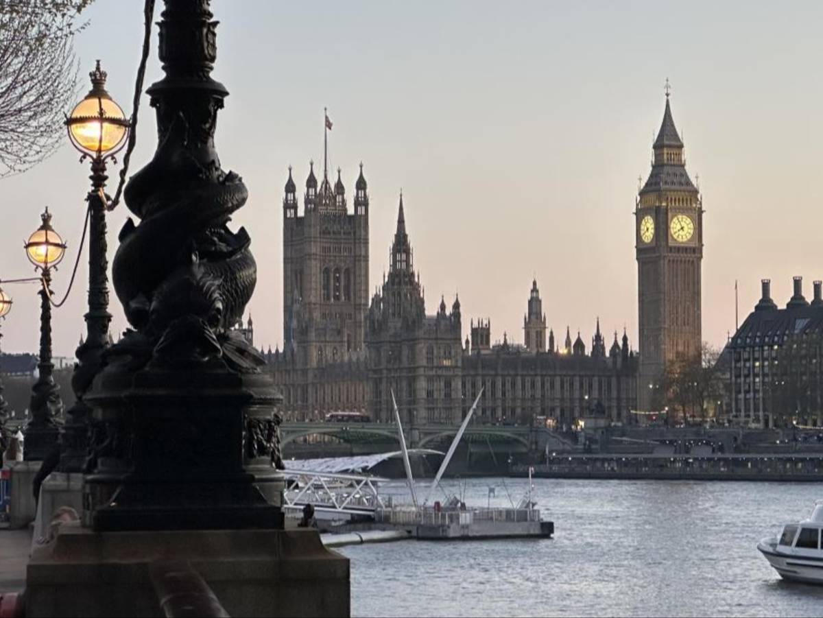 View of Big Ben and the Houses of Parliament along the River Thames in London.