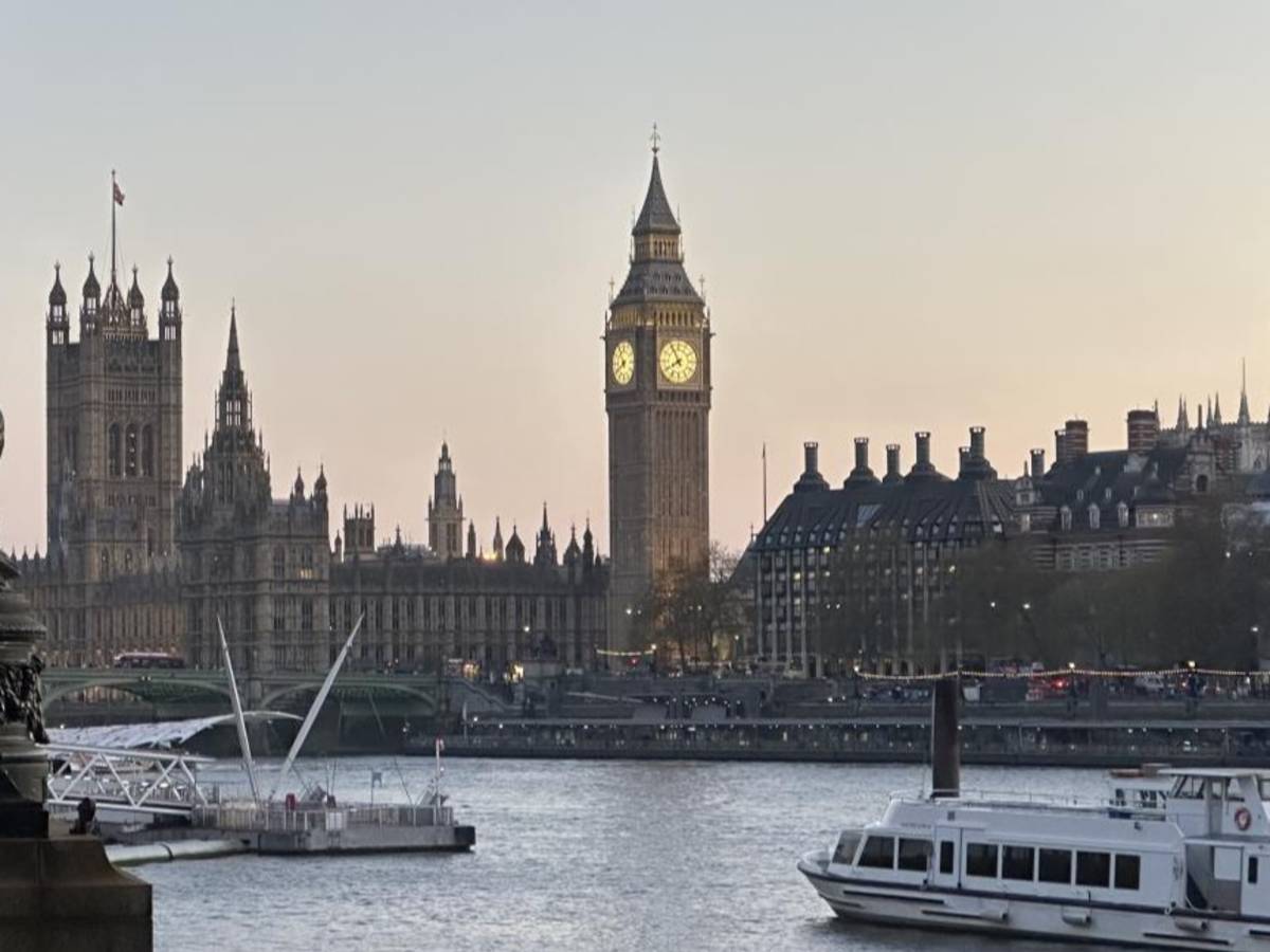 View of Big Ben and the Houses of Parliament along the River Thames in London.