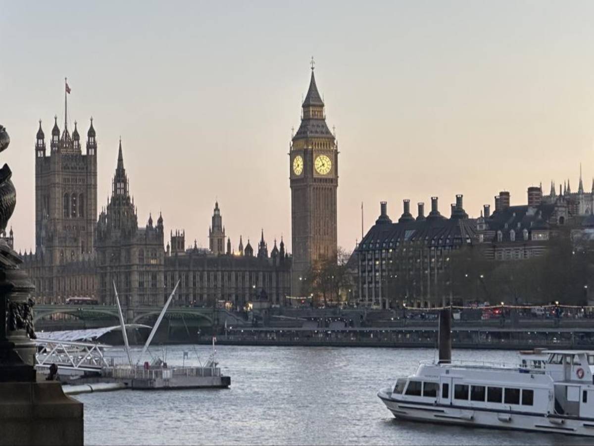 View of Big Ben and the Houses of Parliament along the River Thames in London.
