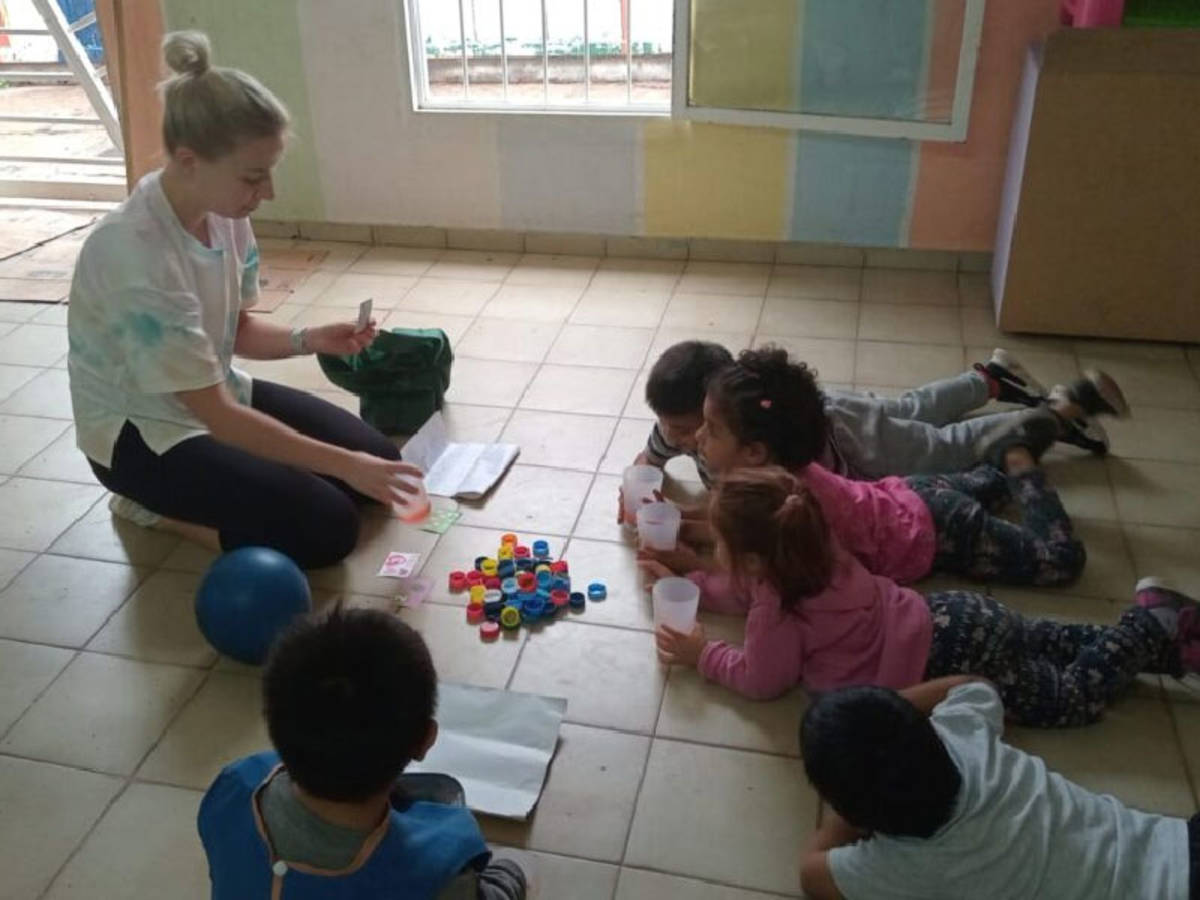 volunteer working with children in the program