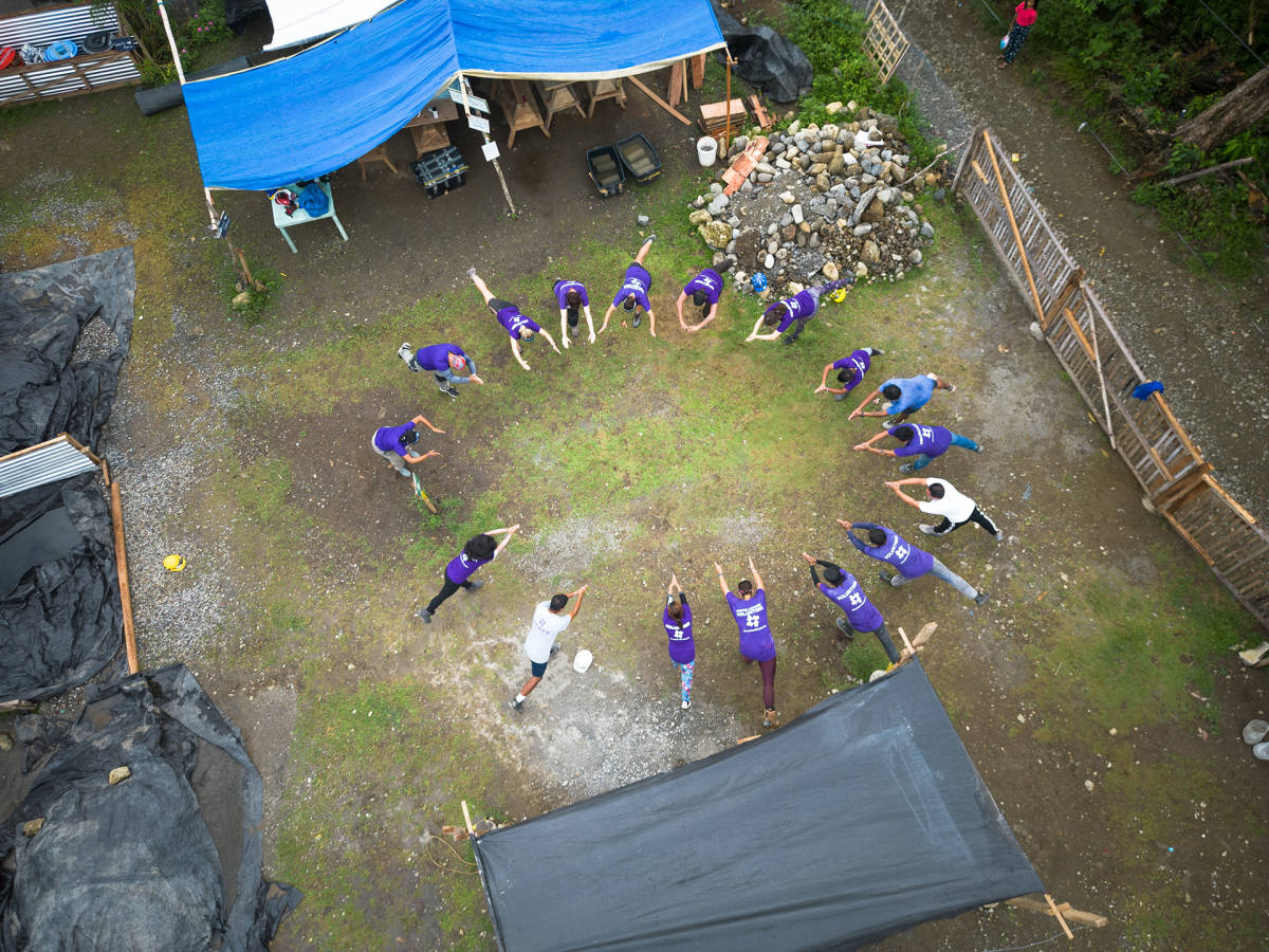 Volunteers stretching in the morning