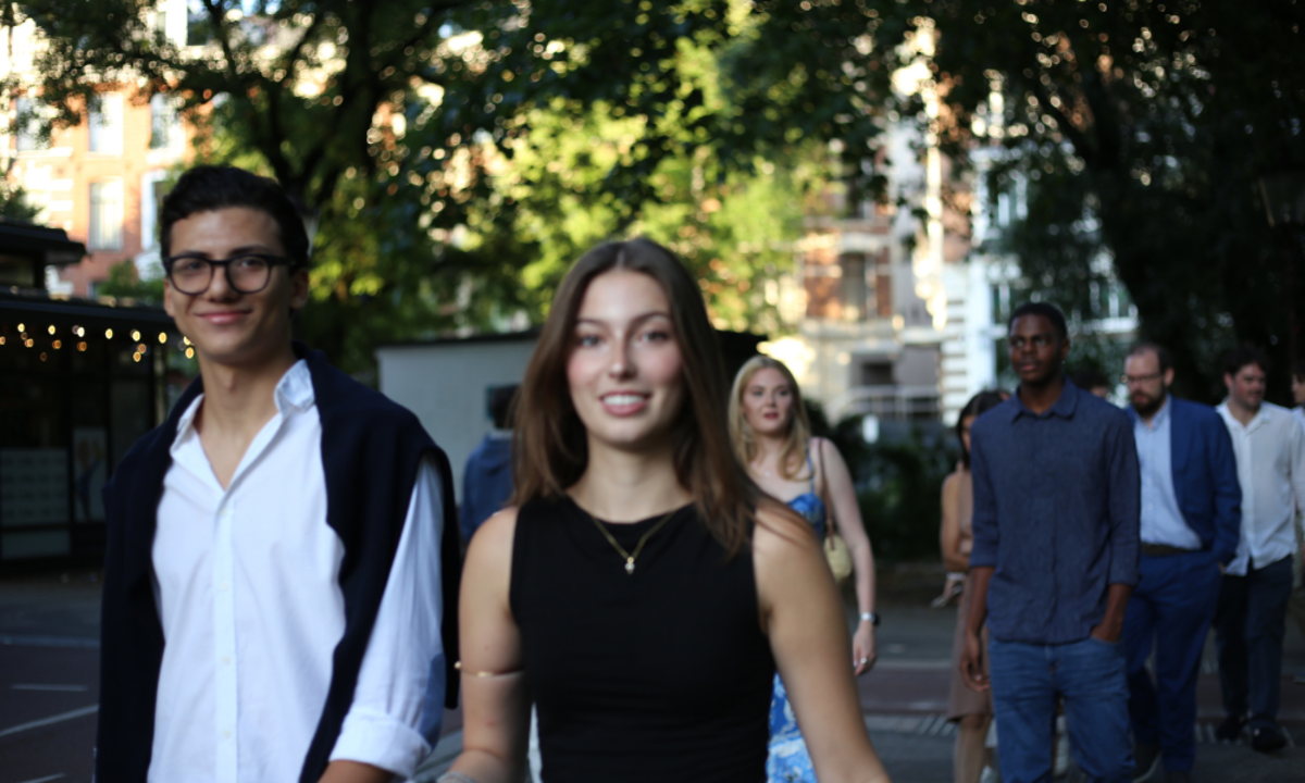 Walking Through Amsterdam on the Way to a Graduation Photoshoot