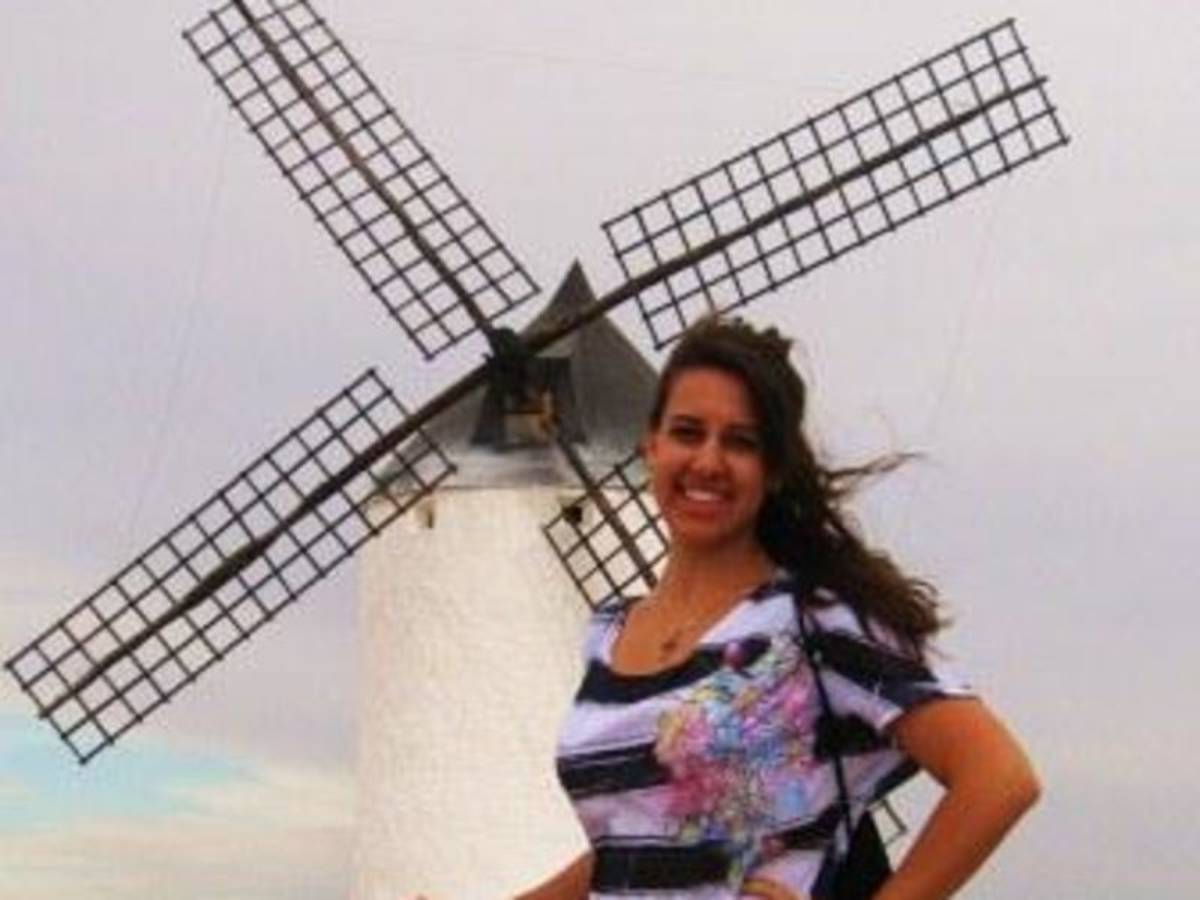 woman by a windmill