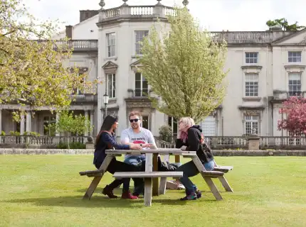students sitting at a table at Grove Lawn