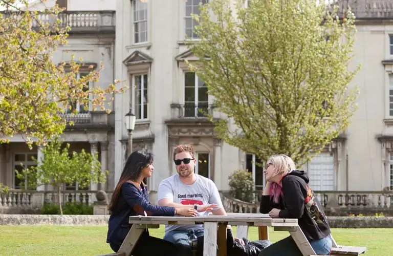 students sitting at a table at Grove Lawn
