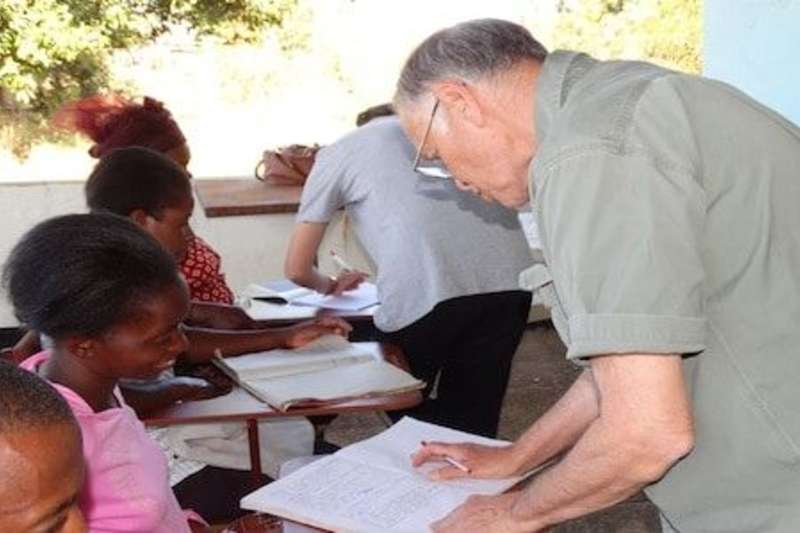 A male volunteer checking work
