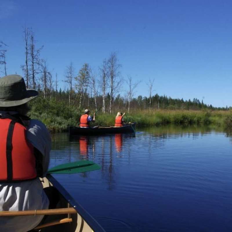 volunteer canoeing on the river