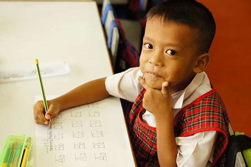 One of the adorable kindergarten students you can expect to teach in Thailand