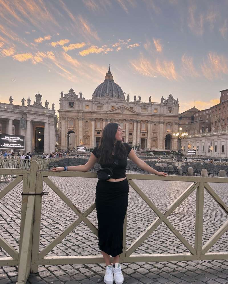 a girl poses in Rome