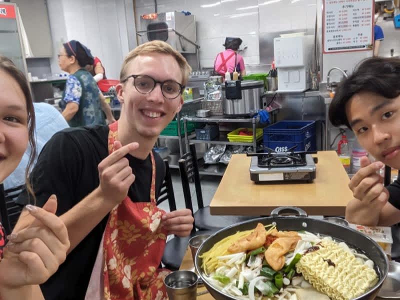 A group of friends eating at Tteokbokki Restraunt in Seoul.