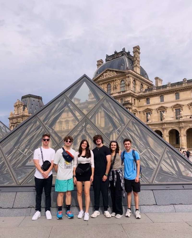 a group poses in Paris 
