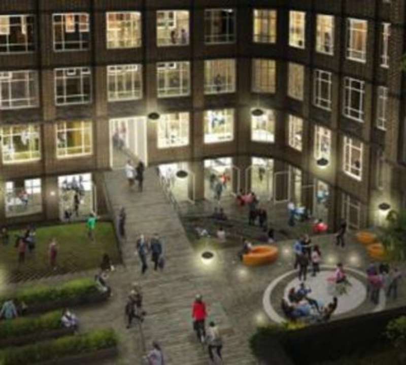 A modern building with a mix of apartments and offices