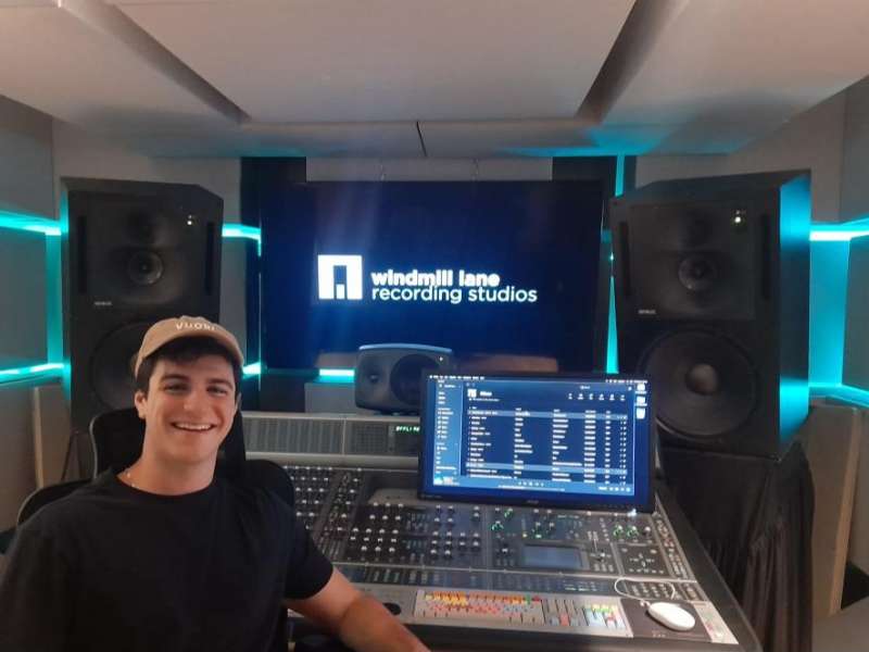 A student sits in a recording studio during his internship in Dublin.
