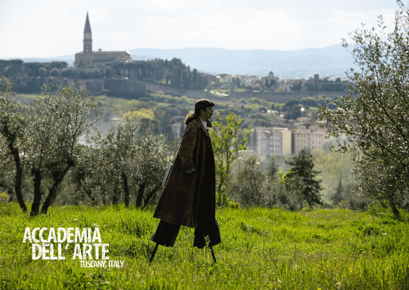ADA student on stilts