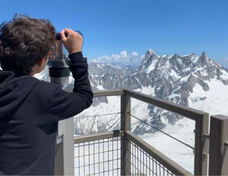 student viewing the french alps