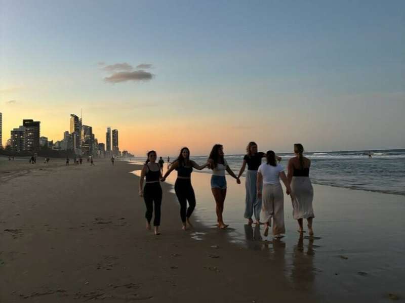 Beach Stroll with Friends