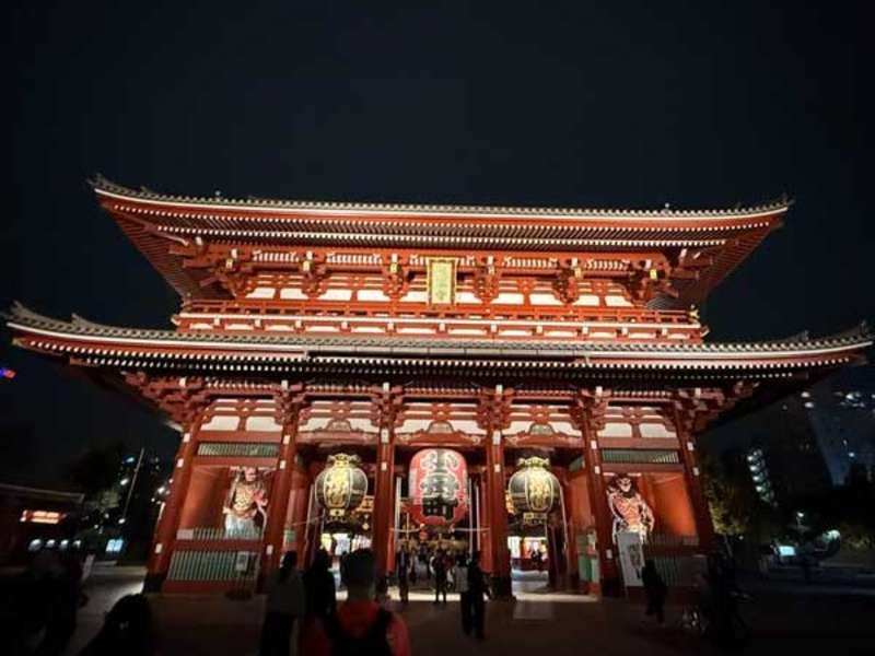 Brightly lit red Senso-Ji temple at night
