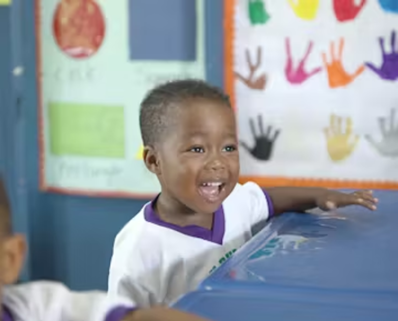 Child Learning from IVHQ Volunteers in St Mary Jamaica 