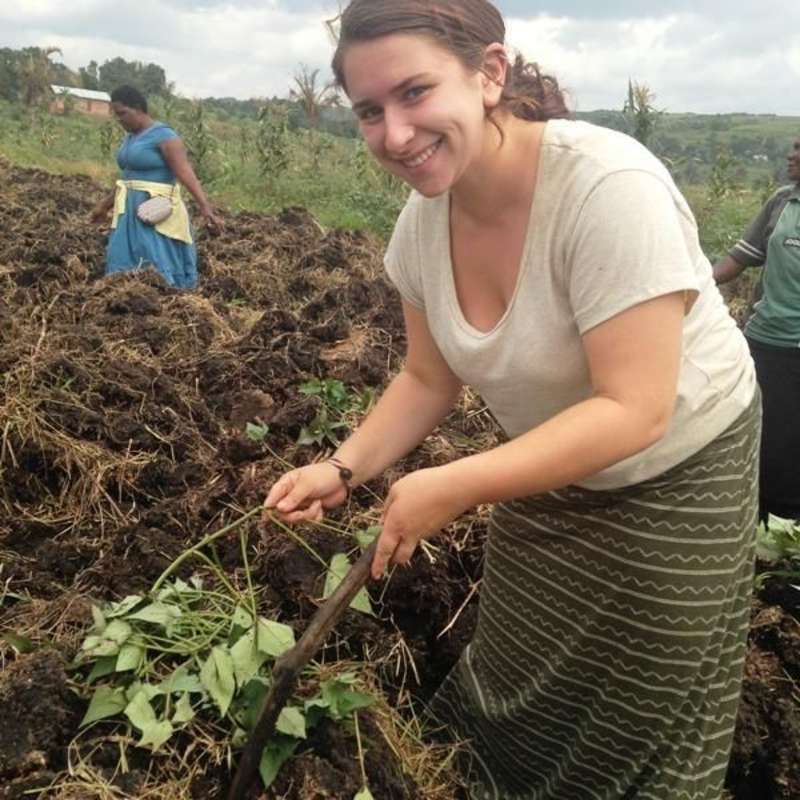 Volunteer working on a communal farm in Uganda