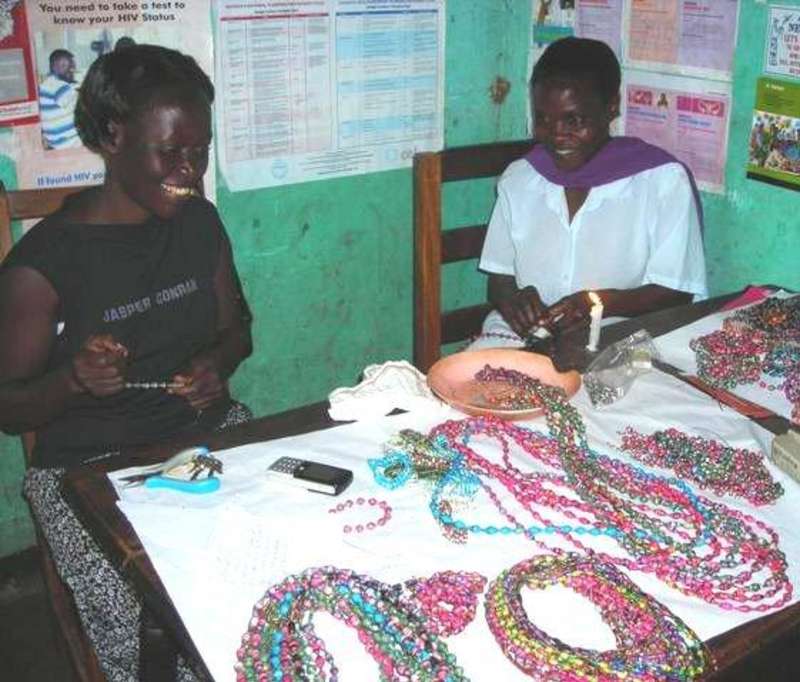 Women displaying their handicrafts for sale in Uganda