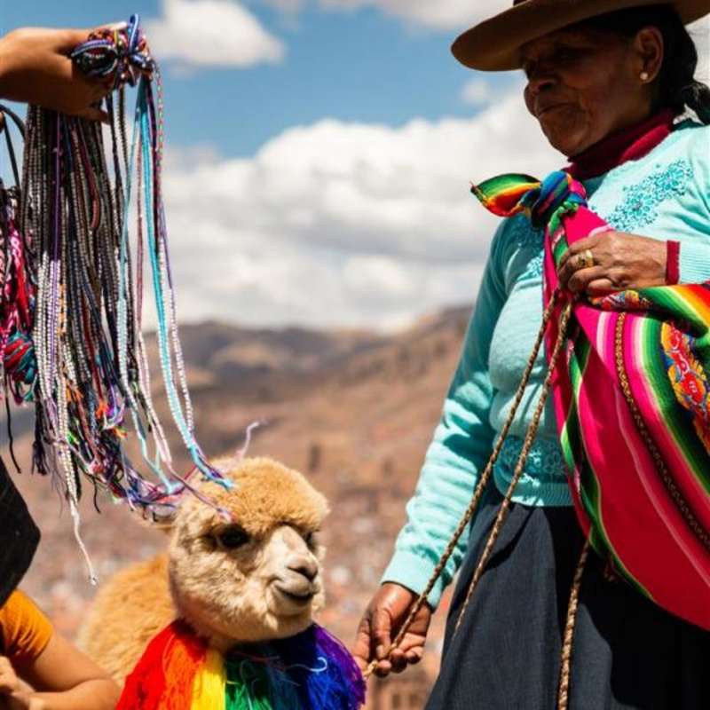 Andean woman with llama in Cusco, Peru
