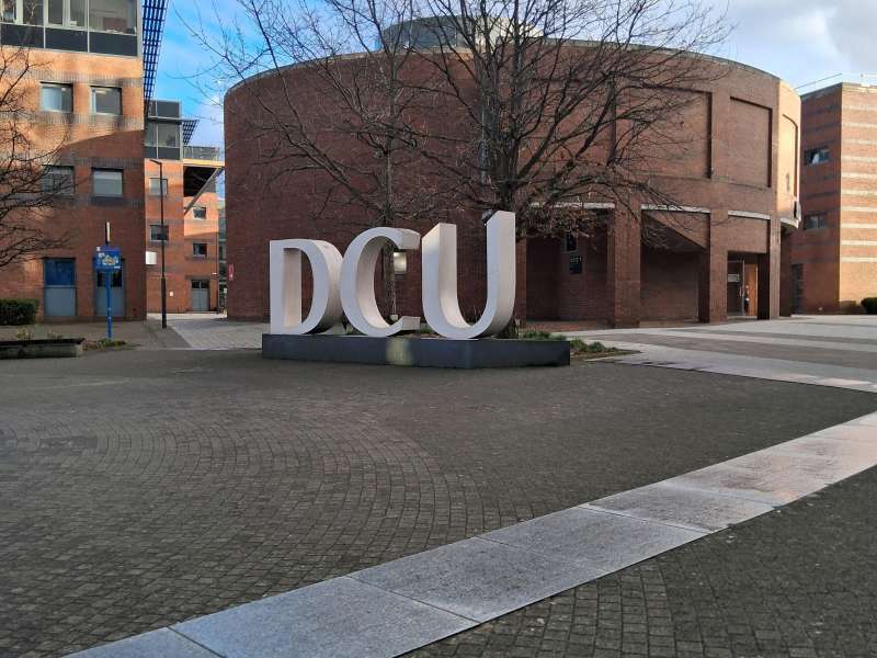 DCU campus with large physical "DCU" letters structure