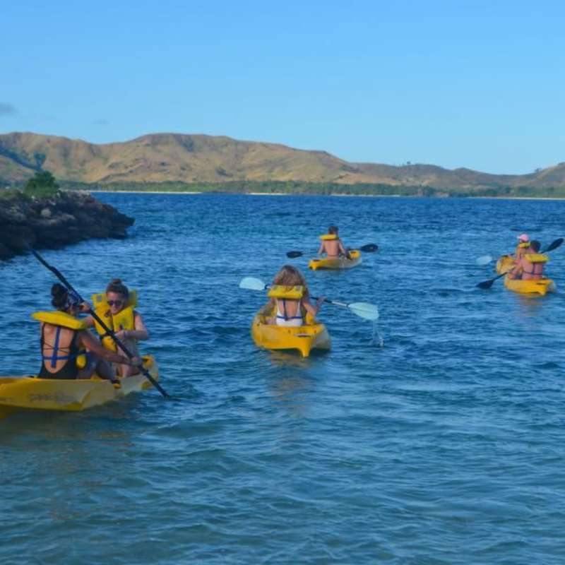 teens kayaking on a summer abroad trip to Fiji