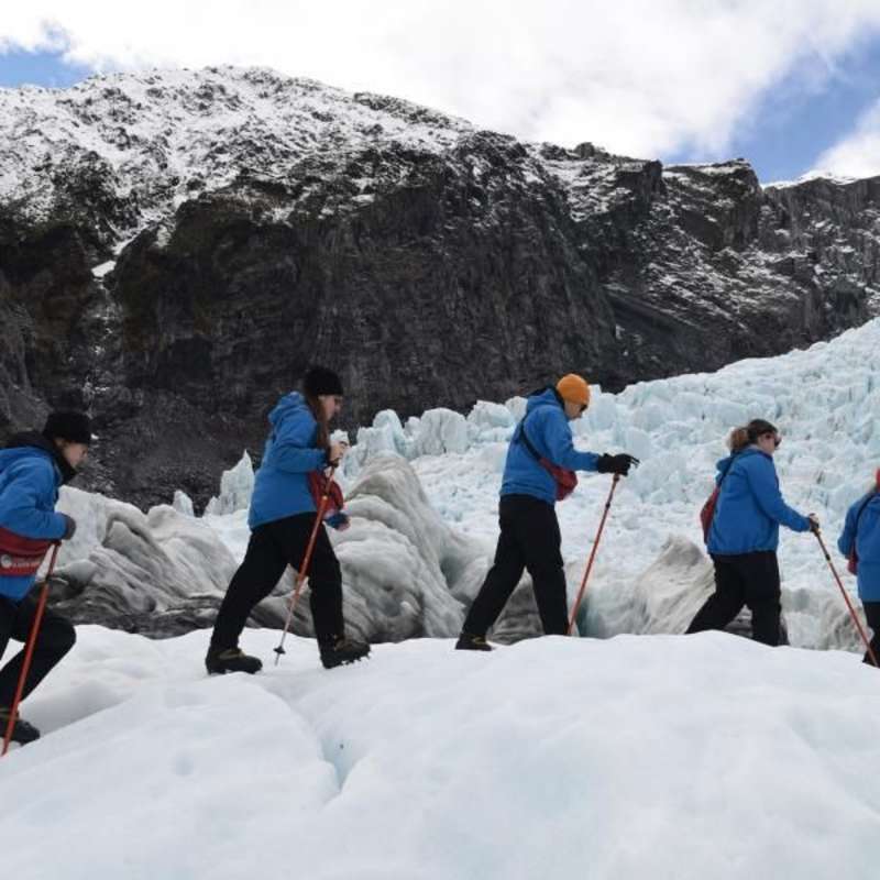 teens ice climbing in new zealand