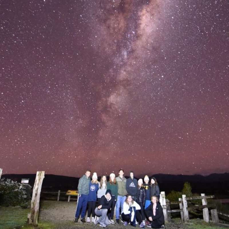 teens under the Milky Way in New zealand