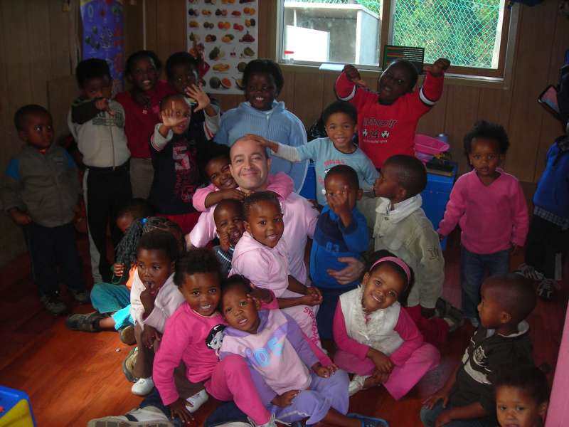 Local children and volunteer