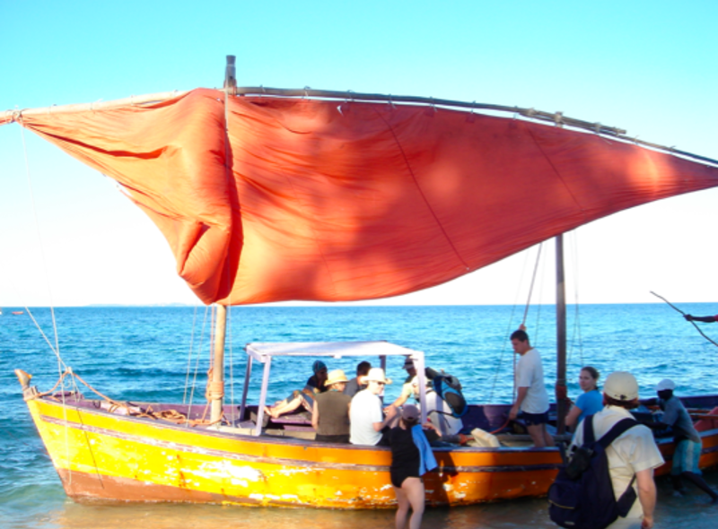 People riding the yellow boat