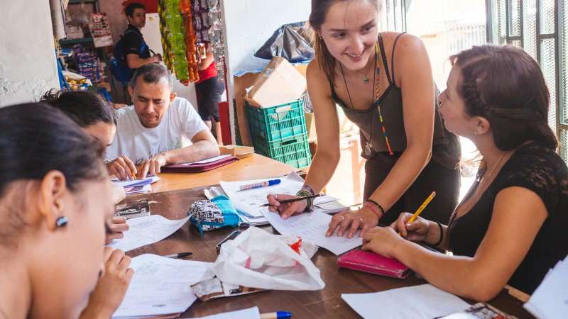 Female Volunteer Teaching a Lady English in Costa Rica