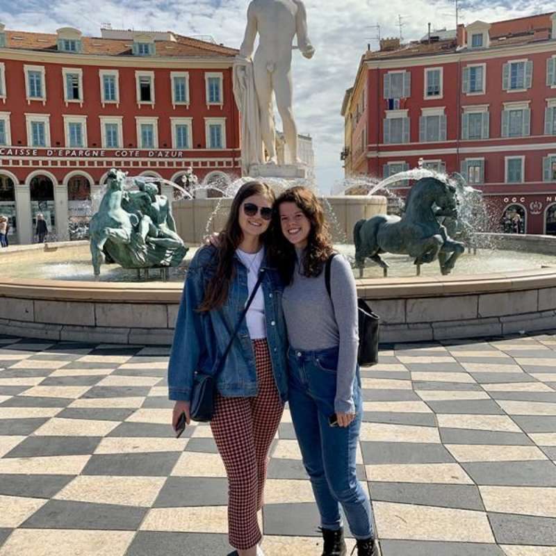 Students in front of fountain